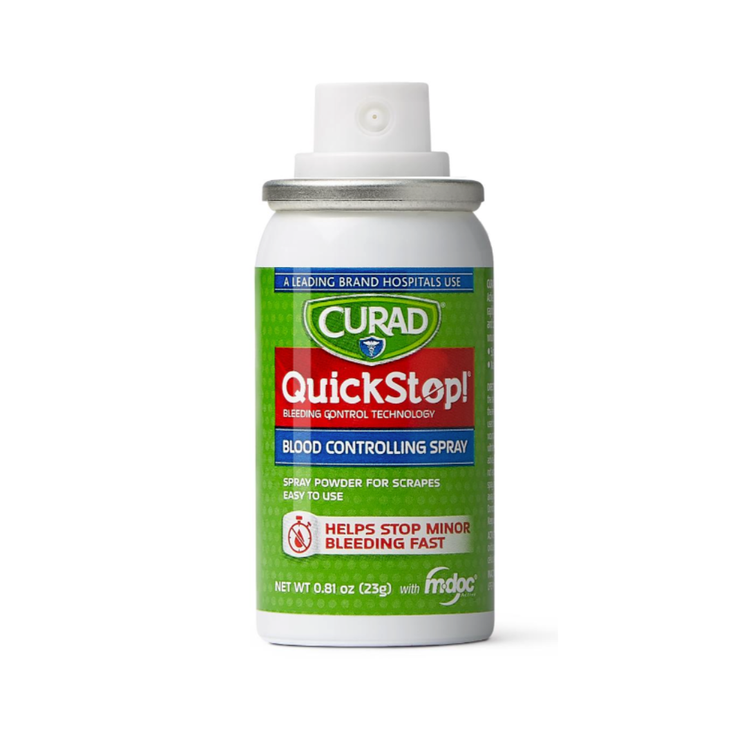 A can of CURAD QuickStop! Blood Controlling Spray, a first-aid solution for minor bleeding, with a green and red label showing instructions and a white spray nozzle.