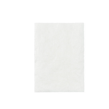 A single plain white paper napkin is centered on a white background, its subtle texture and straight edges resembling the clean look of Medline CURAD Sterile Nonadherent Dressing Pads.