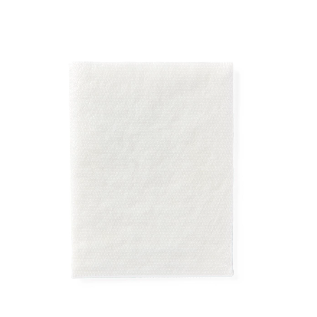 A single Medline CURAD Sterile Nonadherent Dressing Pad is laid flat on a plain white background, featuring a subtle textured pattern and clean edges—ideal for gentle wound care.