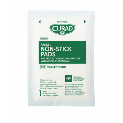A sealed pack of Medline CURAD Sterile Nonstick Pads, 2 x 3 inches with green and white labeling, offers protection, absorbency, and painless removal—ideal as a gentle nonstick wound dressing.