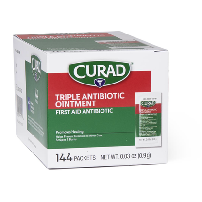 A box of Medline CURAD Triple Antibiotic Ointment contains 144 hospital-quality individual packets to help prevent infection in minor cuts, scrapes, and burns. The box is mainly white and green with red accents.