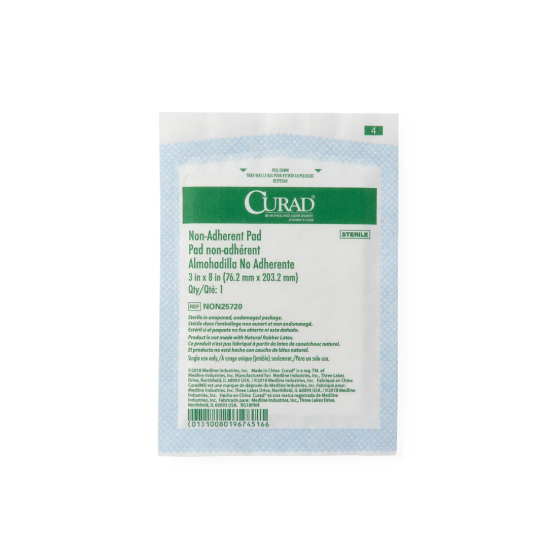 A sealed package of Medline CURAD Sterile Nonadherent Dressing Pads, 3 in x 8 in (7.6 cm x 20.3 cm), displays product details, instructions, and barcode clearly on the front of its white and green packaging.