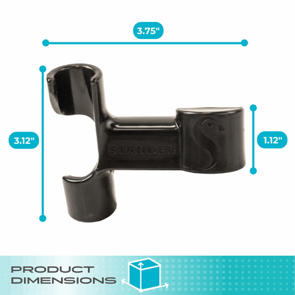 The Cane Holder For Stander Walkers & Rollators is a black plastic clip with two circular openings, embossed with "STANDER." Measures 3.75" W x 3.12" H x 1.12" D—ideal for attaching canes to walkers or rollators.