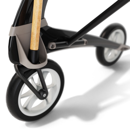 Close-up of a sleek, modern Cane Holder designed for ByAcre Ultralight Carbon Fiber Rollators, featuring a minimalist black and white look with an integrated holder and light wooden handlebar inspired by contemporary rollator design.