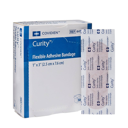 A box of Cardinal Curity™ Fabric Adhesive Flexible Bandage 1" x 3" is shown next to a single wrapped bandage, featuring a non-stick pad for gentle wound protection and blue-white branding.