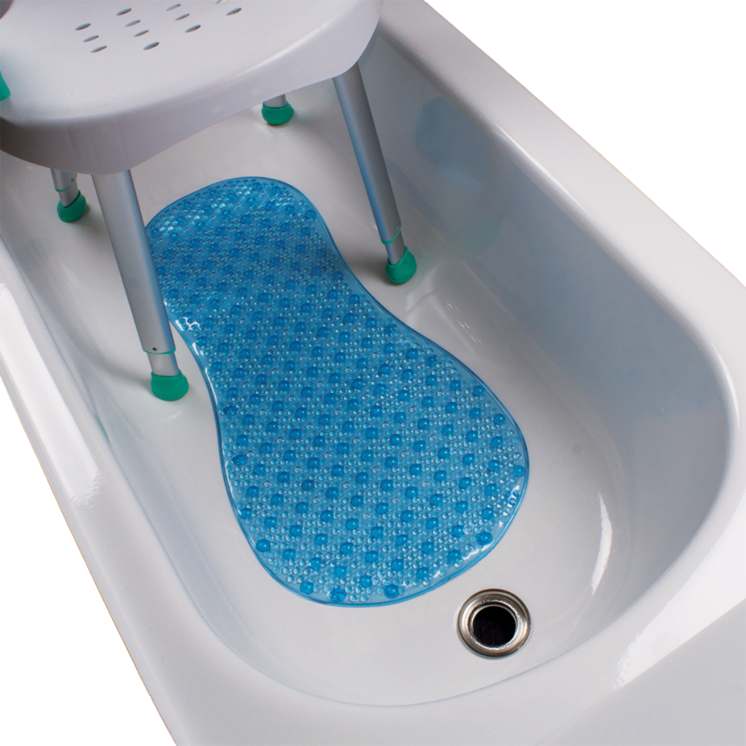 A white bath seat with metal legs stands in a bathtub, which features the Carex Bath Mat For Showers and Tubs (16" x 32") in blue on the floor and a visible drain.