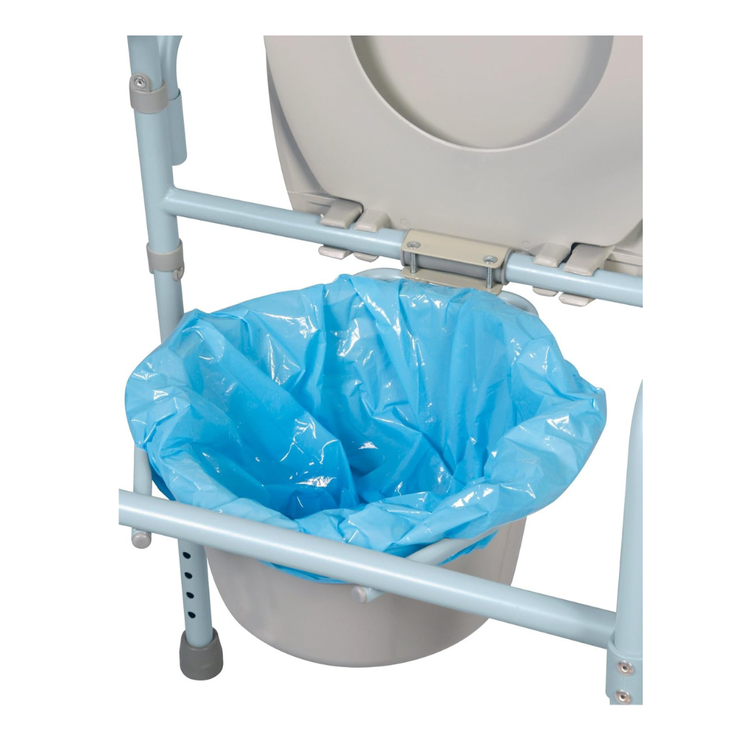 A close-up of a portable commode chair with the seat lid open, revealing a Carex Commode Liner with absorbent powder placed over the removable bucket beneath the seat.
