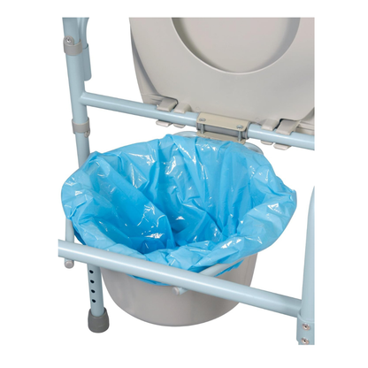 A close-up of a portable commode chair with the seat lid open, revealing a Carex Commode Liner with absorbent powder placed over the removable bucket beneath the seat.