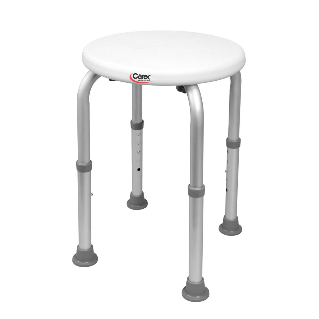 The Carex Shower Stool - Portable & Height Adjustable features a round, white seat with adjustable aluminum legs and gray non-slip rubber feet, providing seniors stability and support in the bathroom.