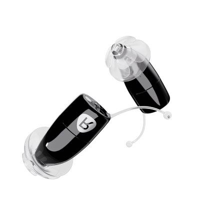 A pair of small, black Ceretone Core One Pro Hearing Aids (Invisible-In-Canal) with clear silicone ear tips and thin wires is displayed against a white background.