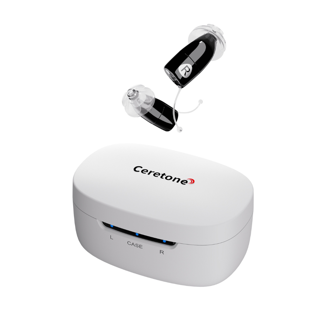 A pair of small black Ceretone Core One Pro Invisible-In-Canal hearing aids with clear ear tips are displayed above a white charging case labeled L, CASE, and R, featuring blue indicator lights.