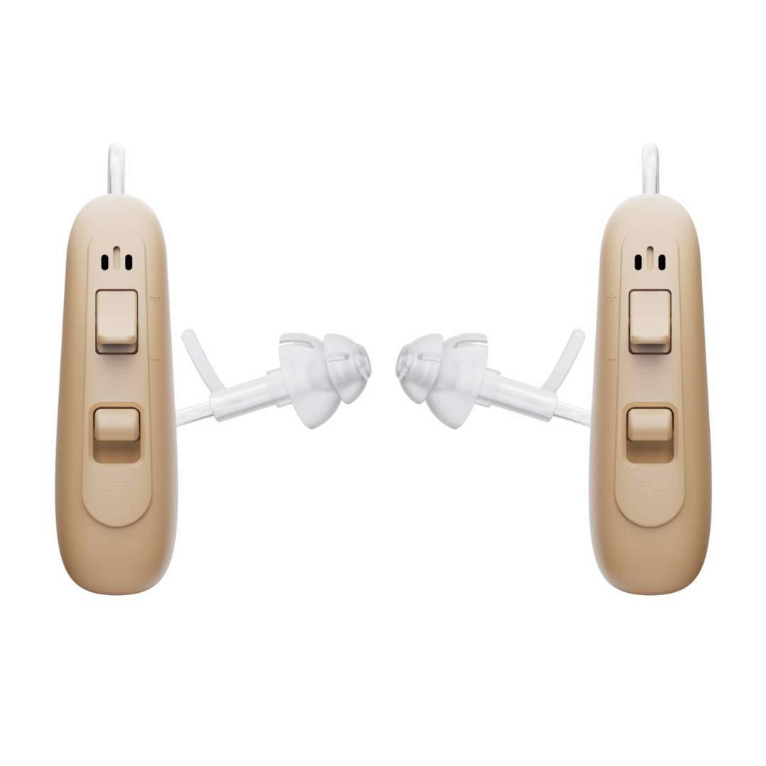 A pair of beige Ceretone Solid Behind-The-Ear Hearing Aids with clear ear tips are shown facing each other against a white background, designed for clear hearing.