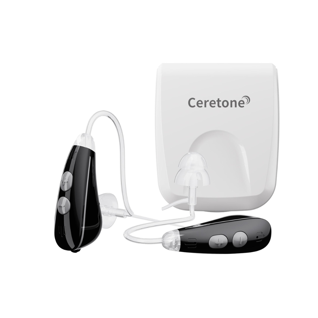 A pair of Ceretone Nexus Behind-The-Ear Hearing Aids in black with clear earpieces and a slim tube, displayed beside a white Ceretone charging case. Warranty and specifications provide added peace of mind.