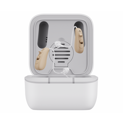 A white charging case displays a pair of beige Ceretone Solid Behind-The-Ear Hearing Aids with their connecting wire, designed for clear sound and comfortable wear.