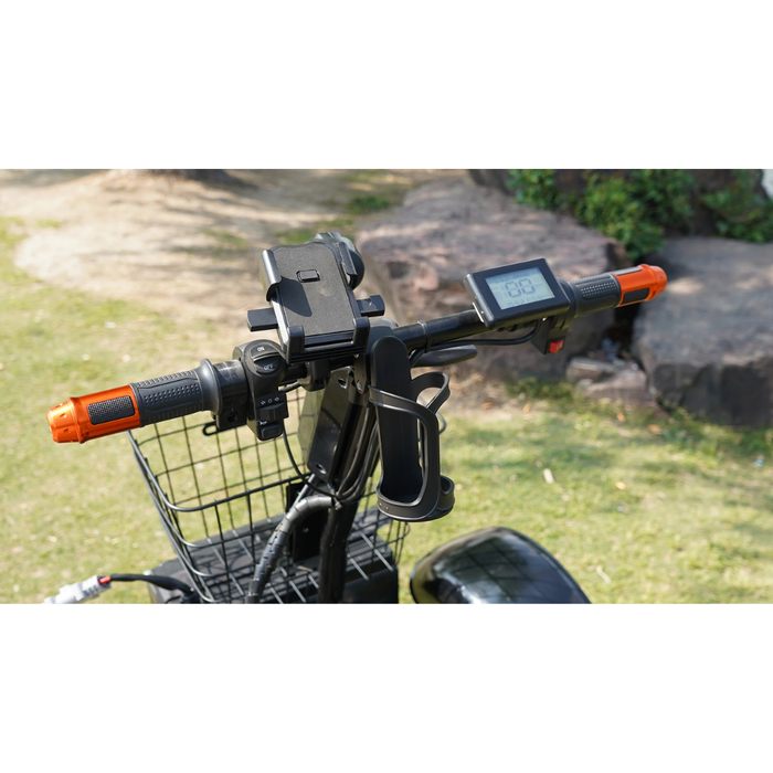 Close-up view of the Green Transporter Cheeta Ninja All-Terrain HD Scooter Golf Cart handlebar with LCD display, phone holder, cup holder, and wire basket—showcasing its lithium battery and all-terrain use on grass near rocks and plants.