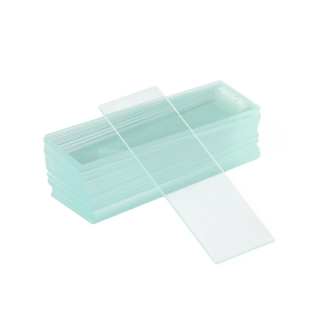 A stack of Medline ClearValue Glass Microscope Slides, with one slide placed diagonally on top, is arranged neatly on a white background.