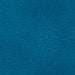 A detailed view of a teal surface reminiscent of leather showcases a fine line network and soft color shifts, echoing the luxurious feel characteristic of Golden Tech PR449 Titan Recliner With Lift Assist, ZG+ & Twilight - Mediums design.