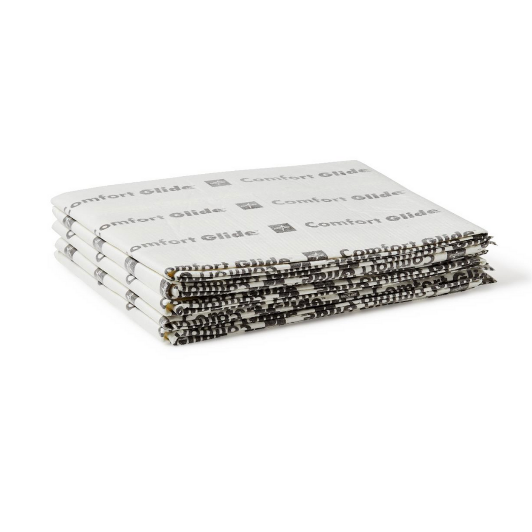 A stack of four folded white Medline ComfortGlide Drypad Underpads - XL, featuring gray branding and designed for excellent moisture management, placed on a plain white background.