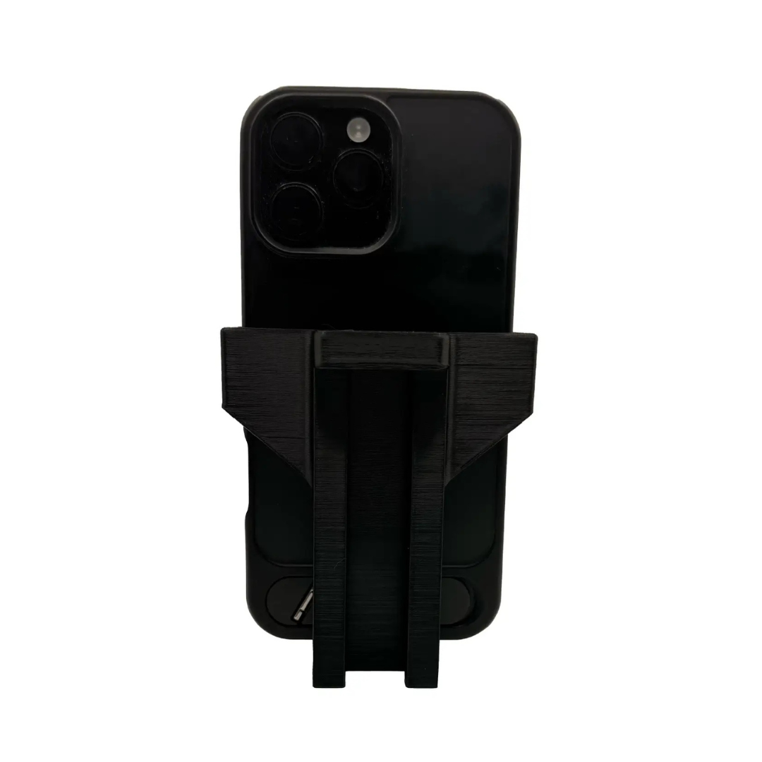 A black smartphone stands upright in the ComfyGo Cup & Phone Holder Combo for ComfyGo Chairs, resembling a compact drink holder, against a white background.