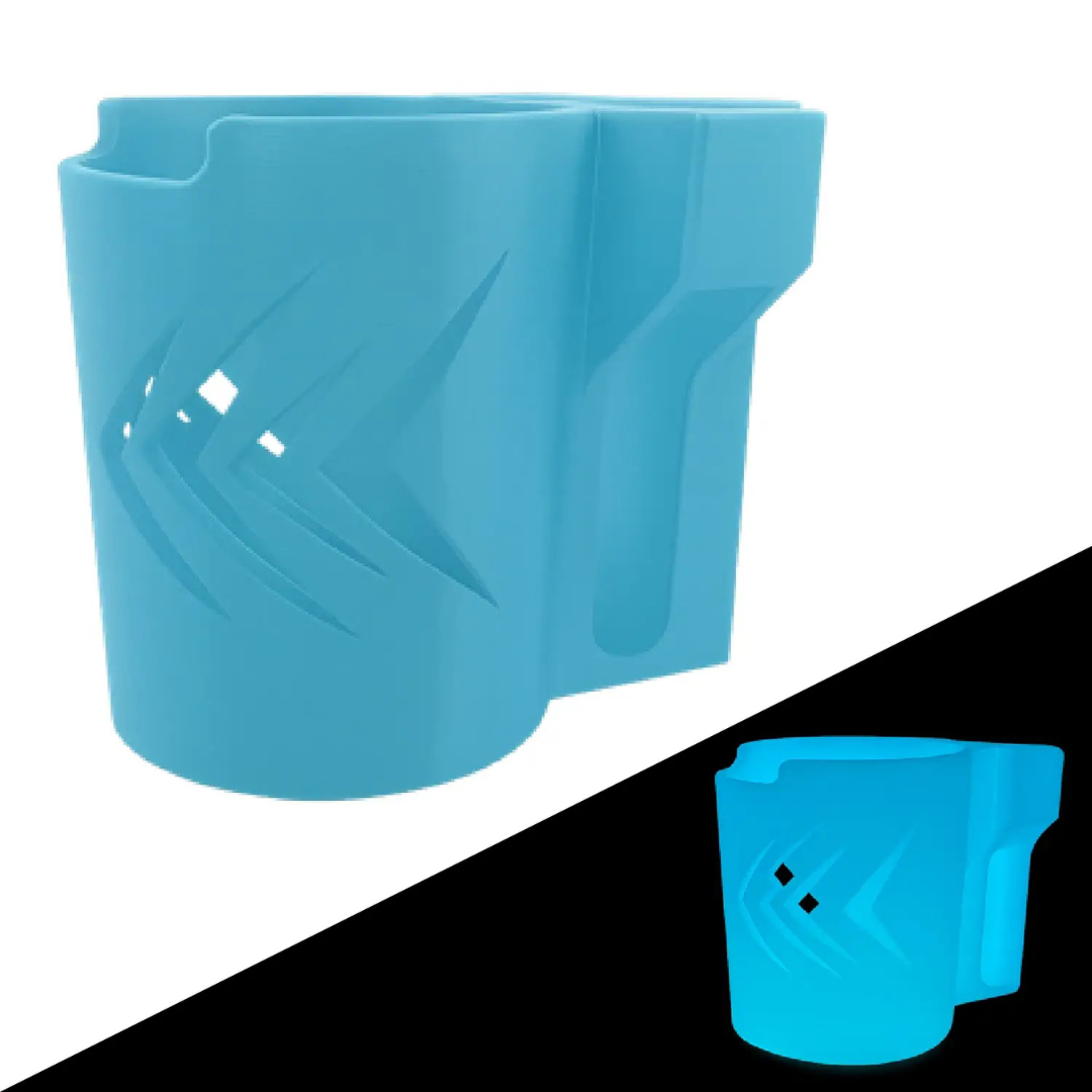 The ComfyGo Cup & Phone Holder Combo for ComfyGo Chairs is a light blue plastic holder with angled cutouts, displayed on a split white and black background—perfect as an electric wheelchair cup holder.
