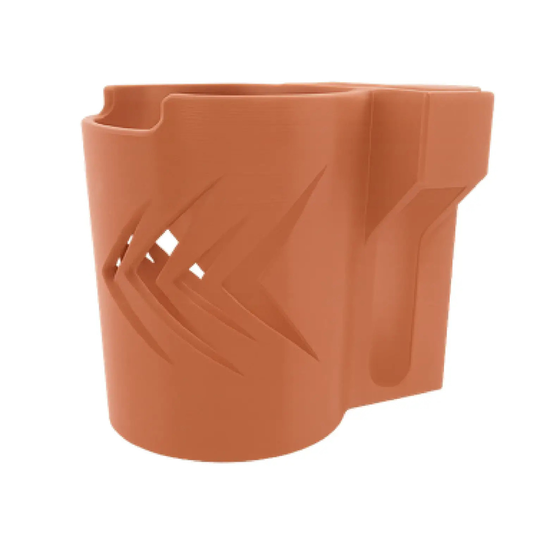 The ComfyGo Cup & Phone Holder Combo is a brown, cylindrical plastic attachment with grooved slits and a rectangular extension that serves as a convenient drink holder for ComfyGo chairs, similar to those on mobility scooters.