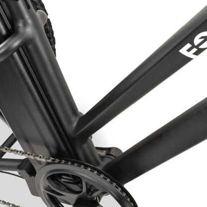 Close-up of the ComfyGo FORTE Electric Tricycle's black frame, highlighting the chain, chainring, and logo on the down tube—ideal for showcasing this all-terrain electric tricycle—set against a white background.