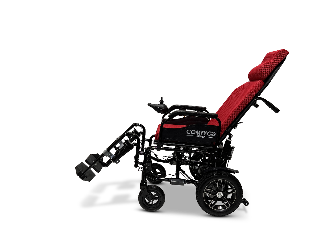The ComfyGo X-9 Remote Controlled Powerchair features a red and black design with automatic reclining, adjustable footrests, and ergonomic support. This four-wheeled mobility solution ensures quality and reliability with the ComfyGo brand prominently displayed on the side.