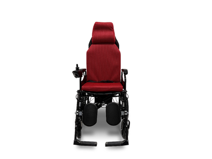 The ComfyGo X-9 Pwerchair features a red design with a high backrest, cushioned seat, and joystick controller on the armrest. Automatic reclining provides comfort along with footrests for an ideal mobility solution set against a solid black background.
