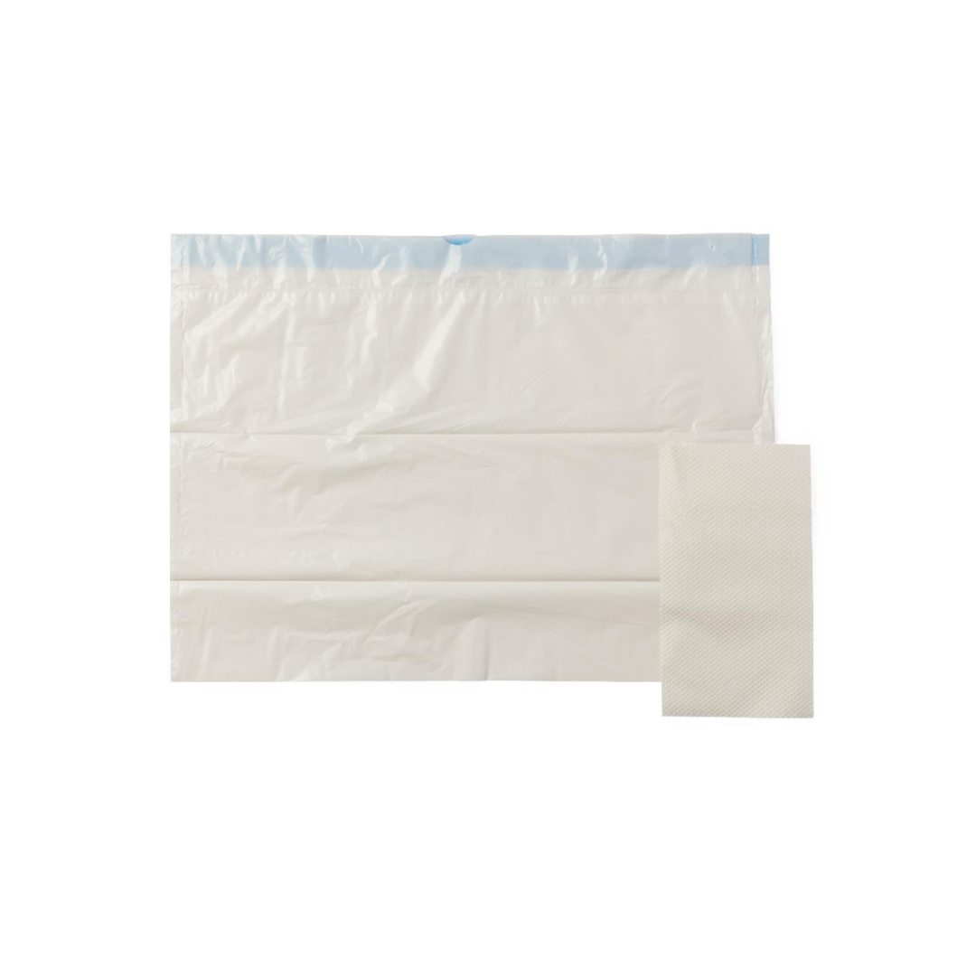 A white plastic bag with a blue strip along the top edge, similar to Medline Commode Liners with Dispenser Cutout, lies flat next to a folded white textured paper napkin on a plain white background.