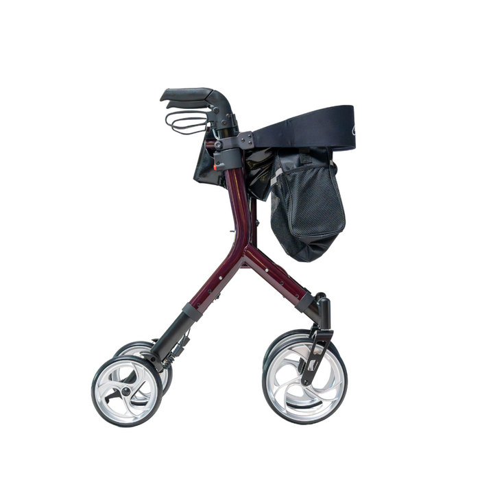 The Compass Health Ascent Premium Euro-Style Rollator is a maroon, lightweight walker with ergonomic handles and four large wheels. It boasts a black seat, handlebars, and an under-seat basket for storage. Its sleek and modern design offers excellent mobility support.