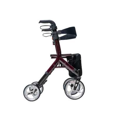 A side view of the Compass Health Ascent Premium Euro-Style Rollator in black and burgundy, featuring four wheels, a seat with under-seat storage pouch, and handles with brakes. Its design is modern and compact.