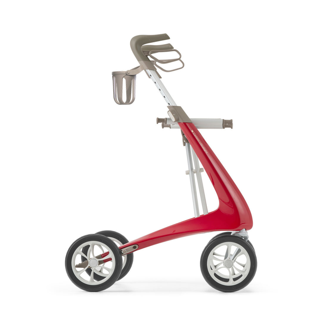 A sleek, modern Cup Holder For ByAcre Rollators is displayed in red and beige on a byACRE device with two large rear wheels and two smaller front wheels, shown in profile against a white background.