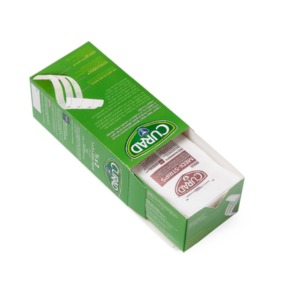 An open green box of CURAD Sterile Medi-Strip Wound Closure Bandages shows white wound closure strips inside, with one packet sticking out—a simple, hypoallergenic adhesive option instead of sutures.