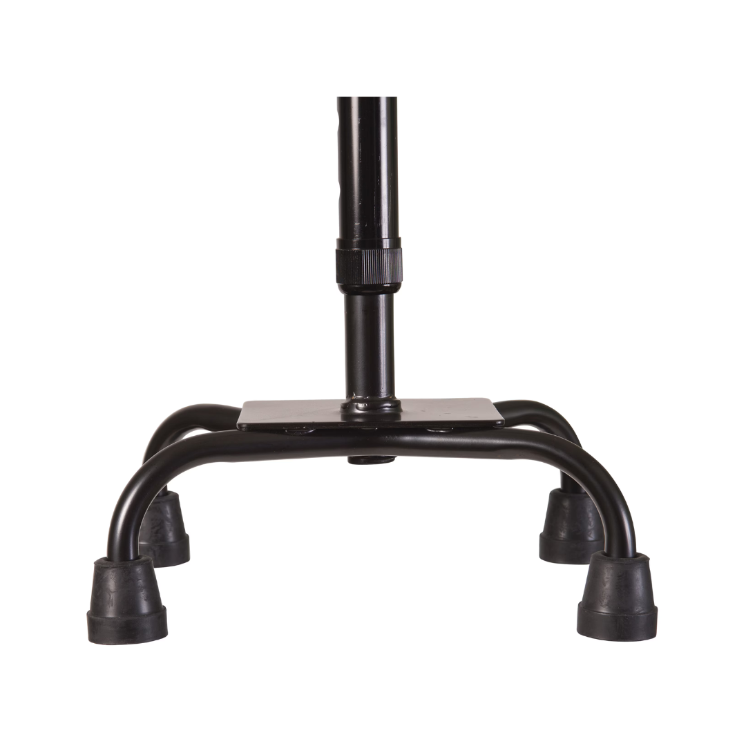 Close-up of the four-footed base of the DMI Adjustable Quad Cane with rubber-tipped feet, offering stability and support against a white background.