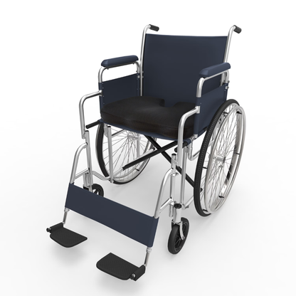 The DMI Premium Coccyx Seat Cushion is shown on a standard manual wheelchair with large rear wheels, small front casters, blue frame, padded seat, and detachable footrests against a white background.