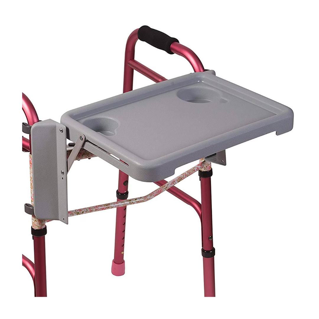 A close-up of the DMI® Folding Walker Tray with Cup Holders attached to a metallic pink walker, offering seniors a practical accessory with a flat surface for carrying items.