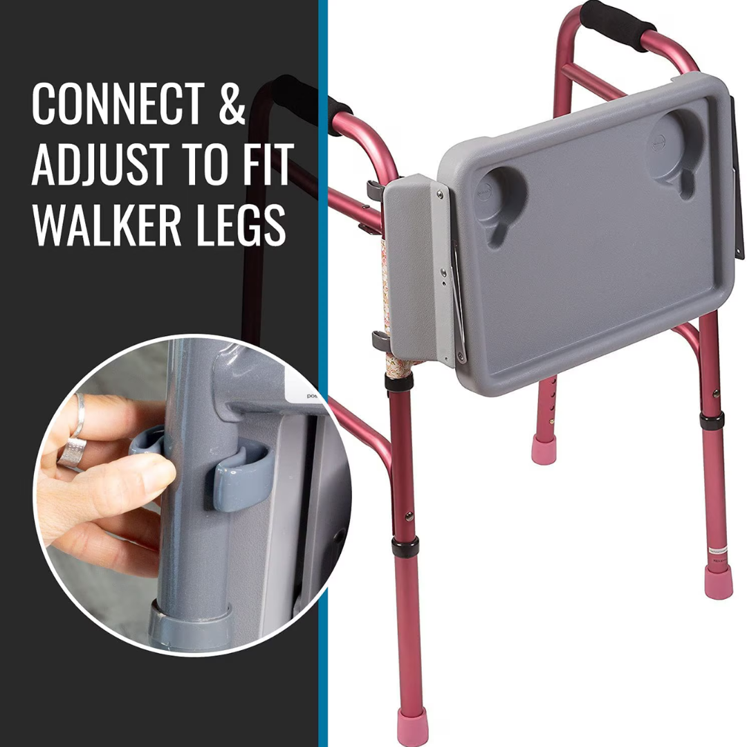 The DMI® Folding Walker Tray with Cup Holders attaches to a pink walker. An inset shows a hand adjusting the gray tray clip. Text: Easily connects and adjusts to fit walker legs—a great accessory for seniors.