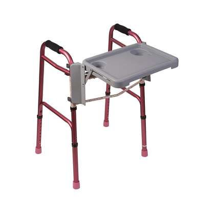 The DMI® Folding Walker Tray with Cup Holders attaches to a pink walker with adjustable legs and black foam grips, offering raised edges and cup holders for convenient mobility support and item transport.