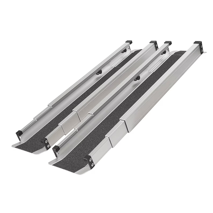Four DMI® Retractable Lightweight Portable Wheelchair Ramps with black non-skid surfaces and raised edges, displayed side by side on a white background.