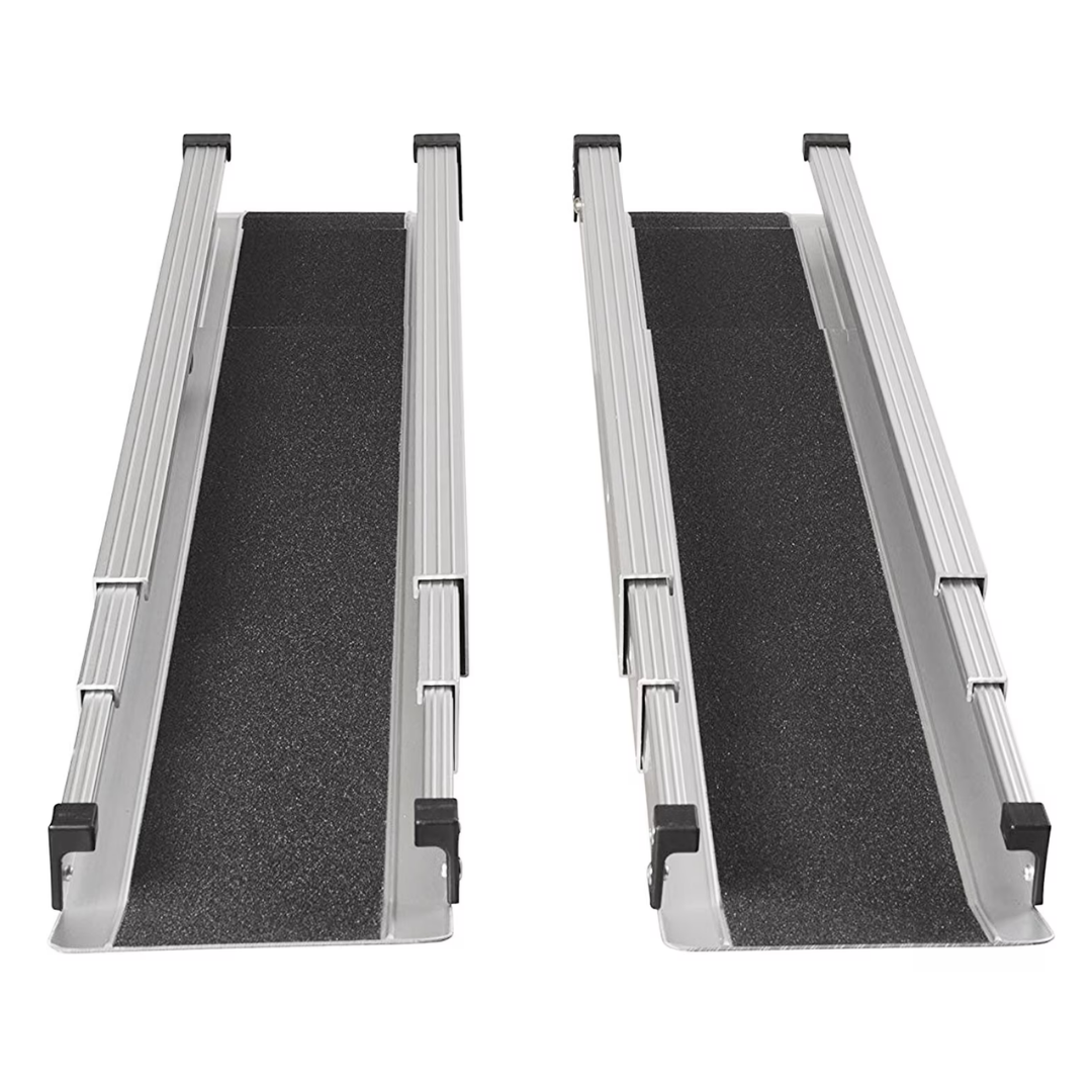 Two DMI® Retractable Lightweight Portable Wheelchair Ramps in silver metal with black non-skid surfaces and raised safety edges are displayed side by side on a white background.