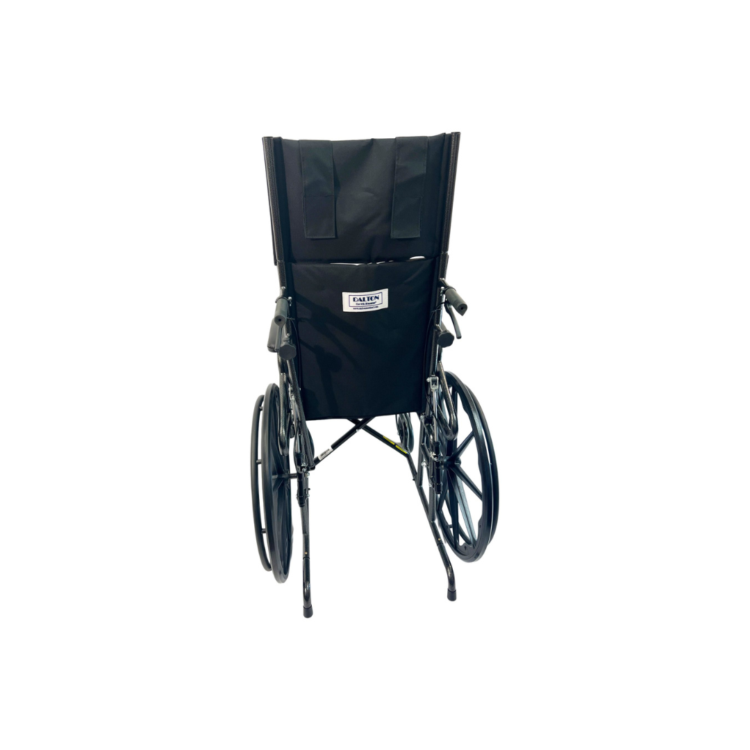 A Dalton Medical Deluxe Recliner Wheelchair in black is displayed from the back against a white background. The wheels, handles, and a small label on the backrest are visible.