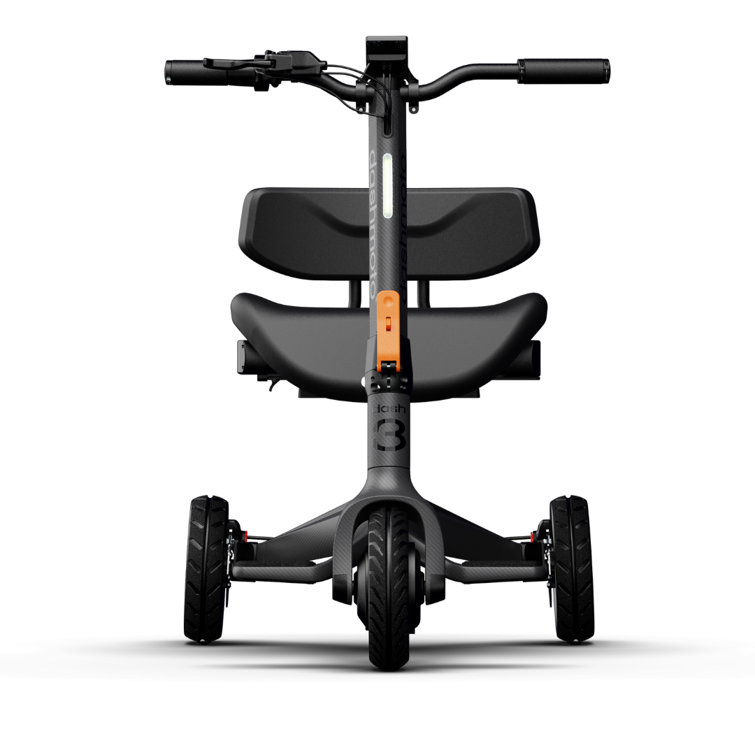 Front view of the Dashmoto High Performance Dash 3 Airlize Approved Travel Scooter: a modern, compact three-wheeled foldable electric scooter with black frame, wide seat, backrest, thick tires, orange-accented handlebars, and UL2271 Certified Battery.