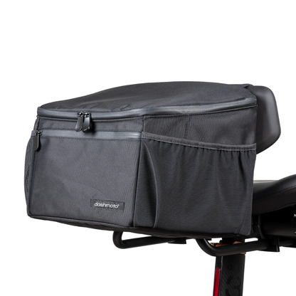 The Saddle Bag For Dashmoto Dash 3 Scooter is a black, Dashmoto-branded tail bag featuring a zippered main compartment and side pockets that attaches to the rear seat of your motorcycle, making it a versatile mobility accessory for your Dashmoto Dash 3 scooter.