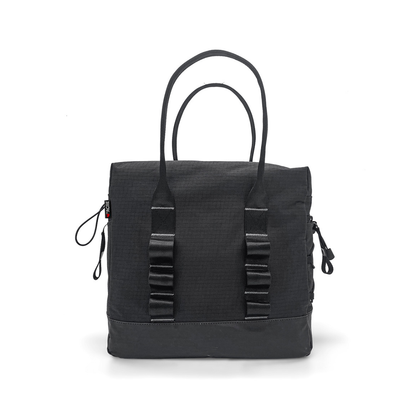 The Daypack For ByAcre Carbon Fiber Rollators is a black rectangular tote with dual handles, side zippers, and front webbing—perfect as a mobility accessory or rollator backpack. Shown on a plain white background.