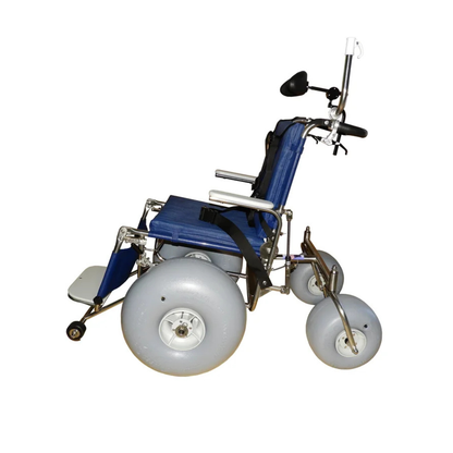 The DeBug All-Terrain Beach Wheelchair features blue and silver colors, large gray wheels for sand or rough terrain, a seatbelt, footrest, and a handlebar rearview mirror for enhanced outdoor mobility.
