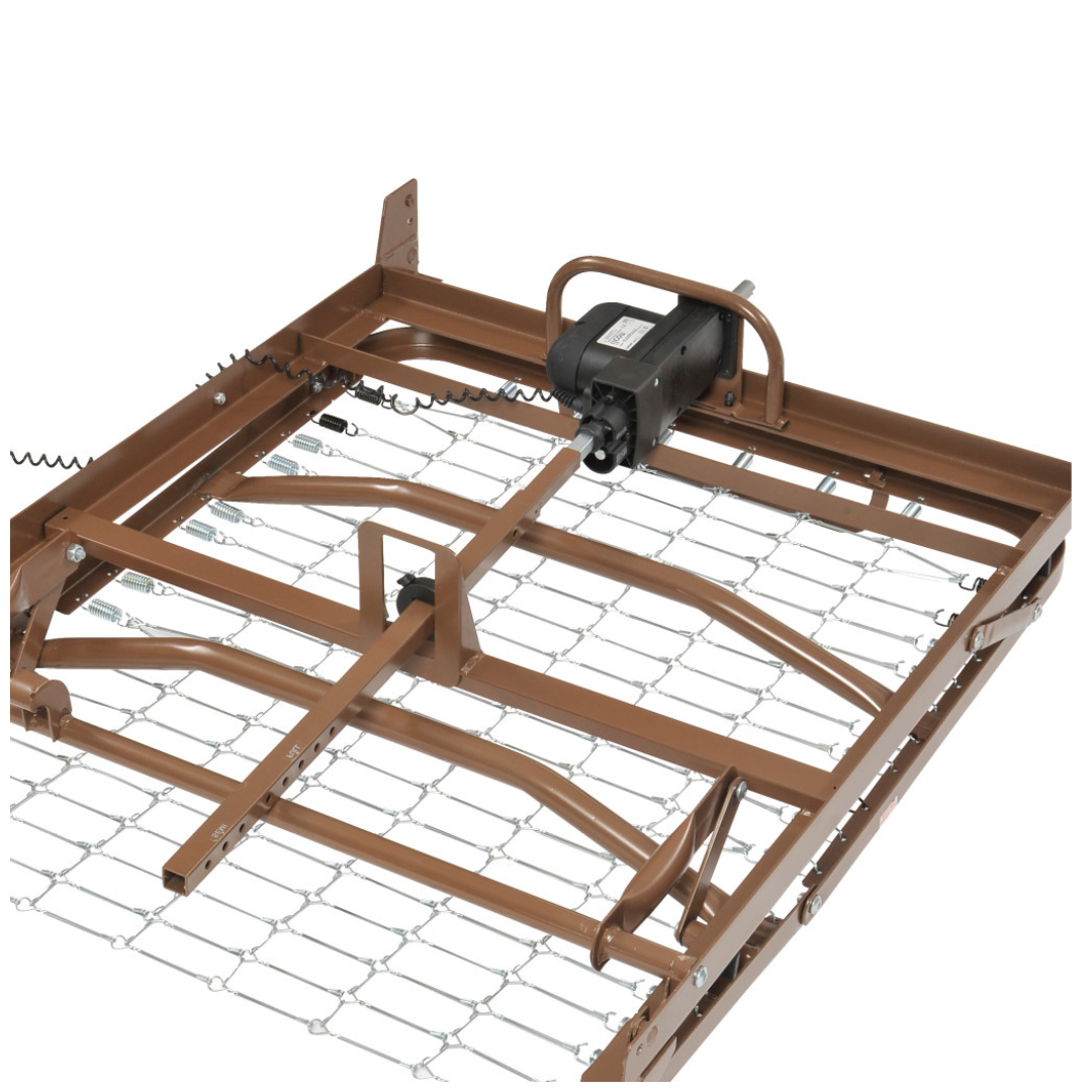 A close-up of a brown metal adjustable hospital bed frame like the Drive Delta® Ultra-Light 1000 Bariatric Full-Electric Low Bed, featuring a wired grid base and an electric motor for adjusting the frame sections.