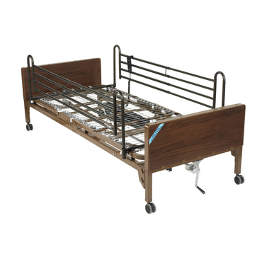 The Drive Delta® Ultra-Light 1000 Bariatric Full-Electric Low Bed features wooden head/footboards, metal side rails, caster wheels, and a brown frame. Mattress not included. Height and position adjust electrically.
