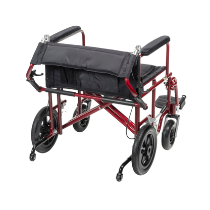 The Drive Bariatric Aluminum Transport Chair features a 22" seat, foldable red frame, black seat and backrest, large flat-free rear wheels, smaller front wheels, and footrests. Shown from the back, the chair is partially folded for storage or transport.