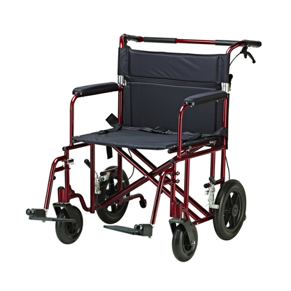 The Drive Bariatric Aluminum Transport Chair - 22" Seat features a lightweight maroon frame, black seat and backrest, armrests, large flat-free rear wheels, and handle grips for added convenience.