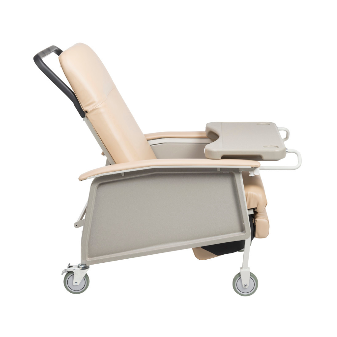 The Drive 3-Position Geri-Chair Recliner with Wheels, shown in profile on a white background, features a beige padded seat, adjustable backrest, tray table, armrests, and wheels—ideal for patient care.
